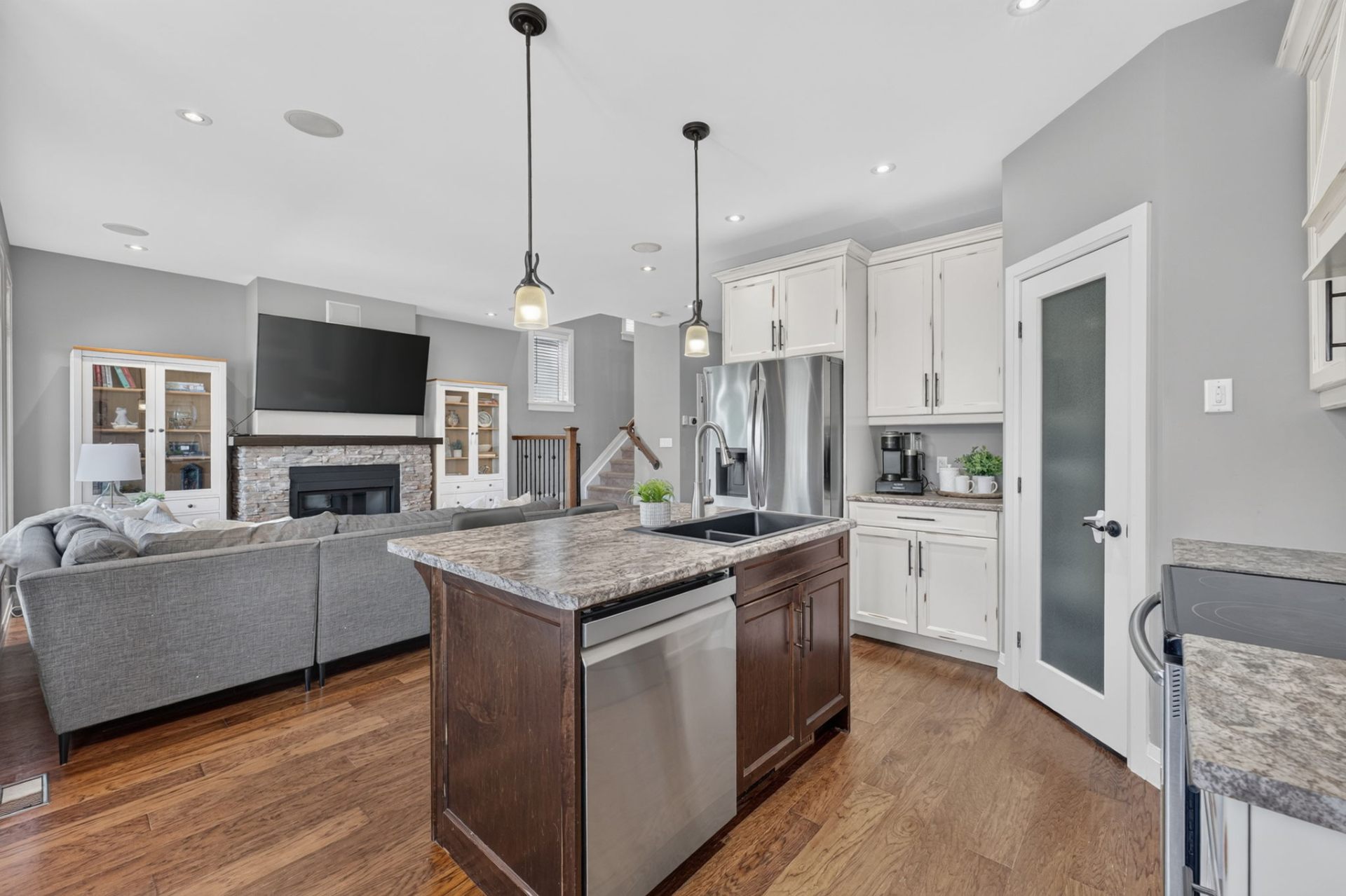 Kitchen island with walk-in pantry and main-floor laundry